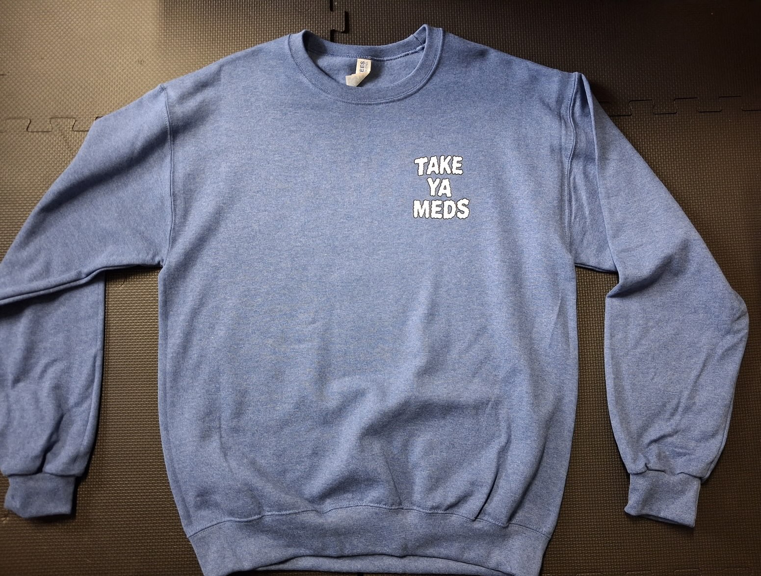 Heather-blue Take Ya Meds crew neck sweatshirt with the chest print